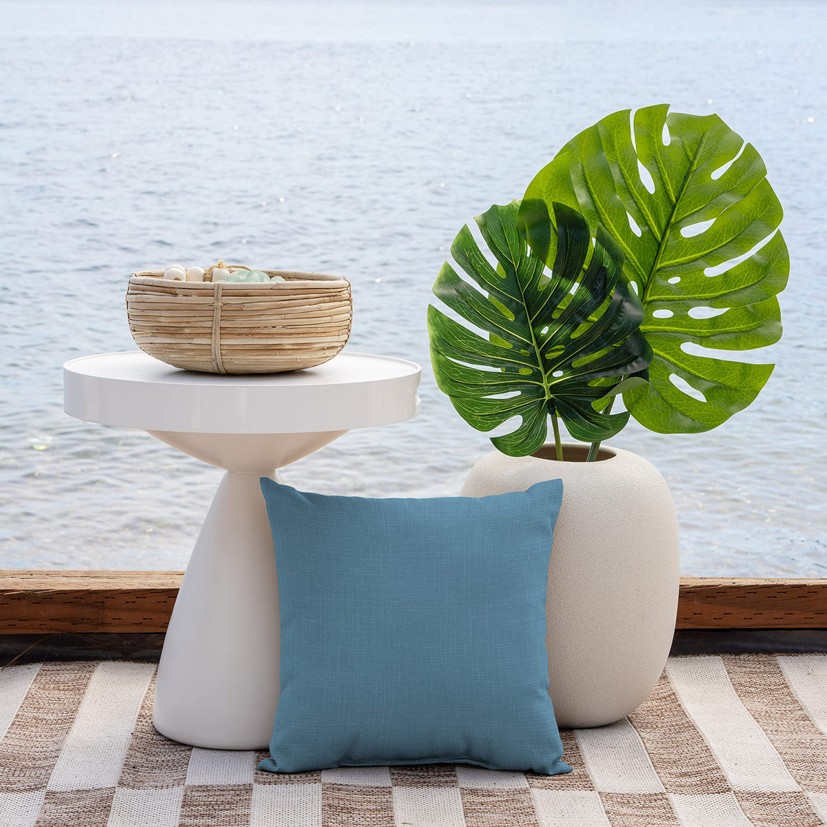 Arden Selections outdoor toss pillow side view showing 16x16 size and compact design.