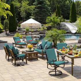 Arden Selections Salome Tropical pillow on patio furniture.