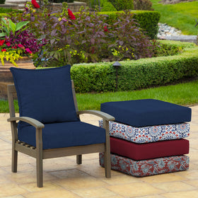 Arden Selections Sapphire Blue cushion shown on an outdoor chair setup