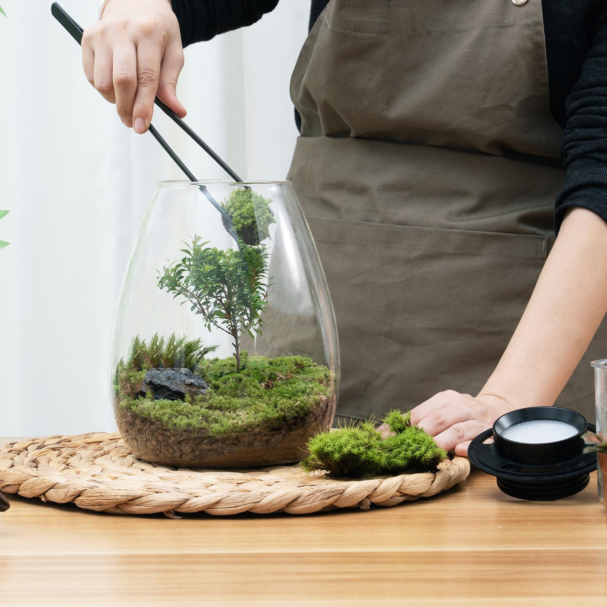AREPK glass cylinder terrarium office setup on desk