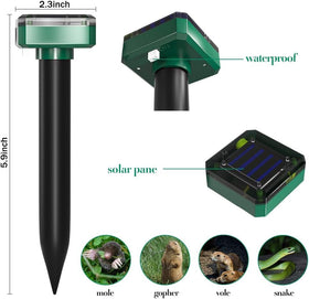 Ariie Mole Repellent device being installed in ground to protect garden beds.