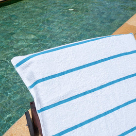 Arkwright Las Rayas outdoor chair cover demonstrates easy machine-wash care.
