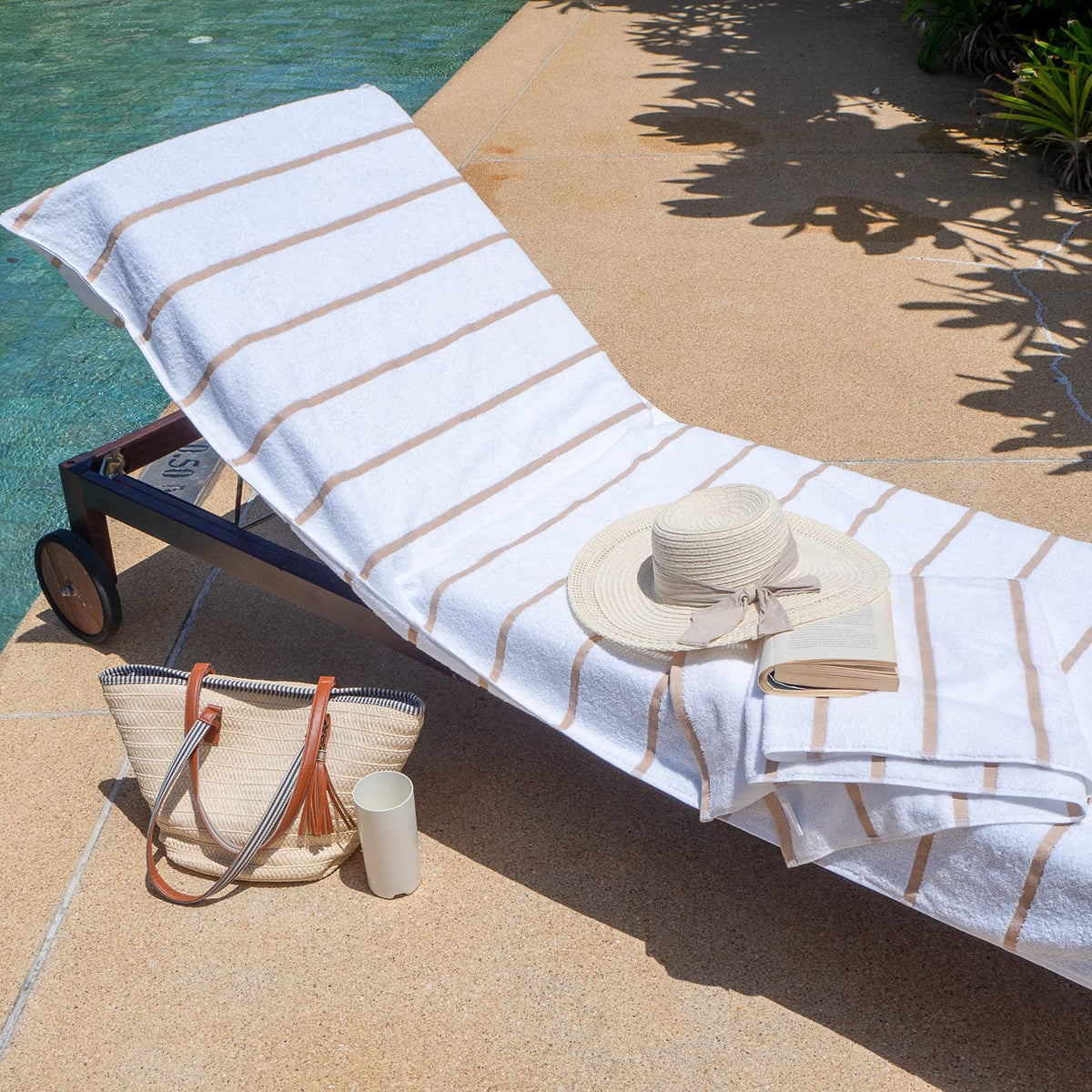Backyard patio setup with Arkwright Las Rayas covers on loungers