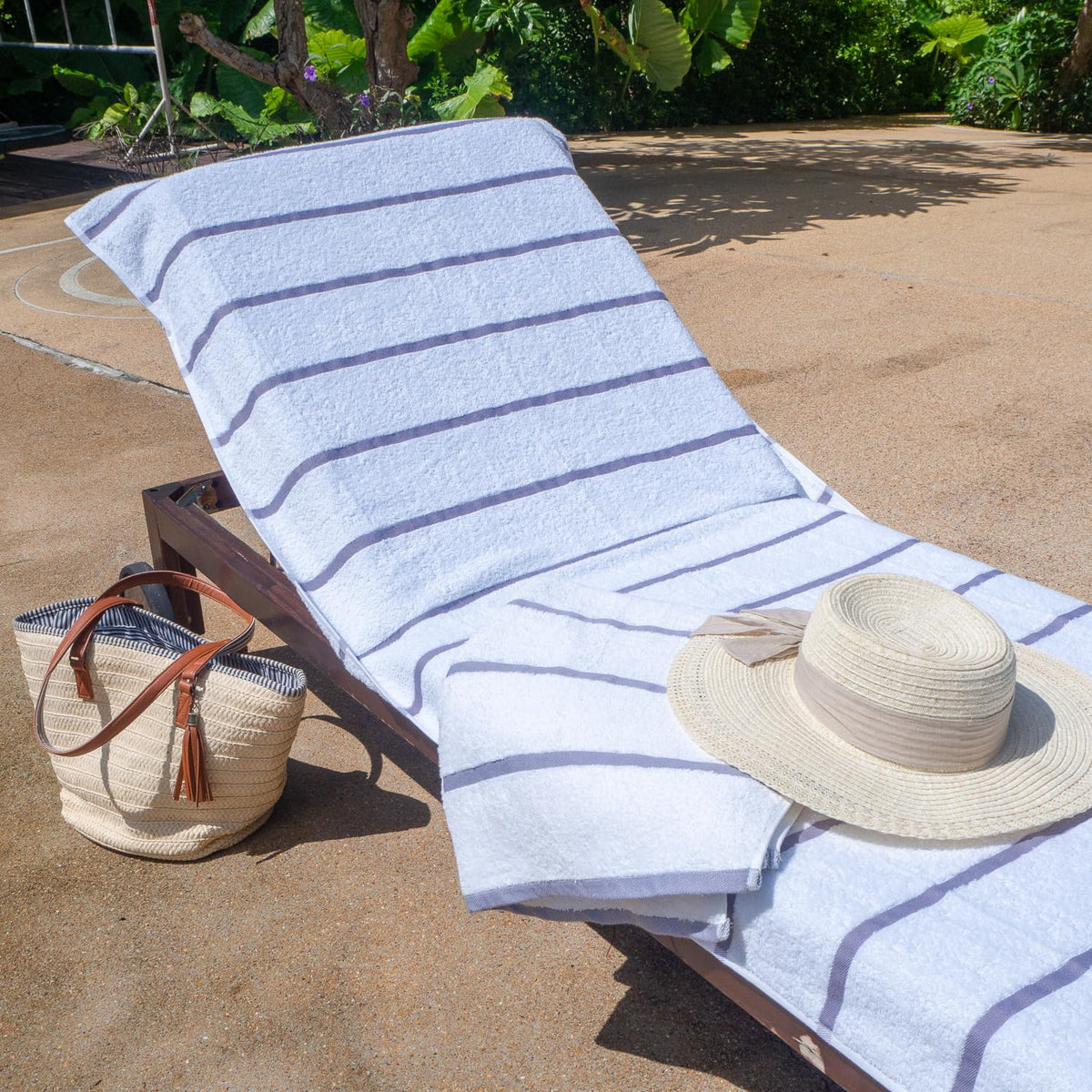 Arkwright vibrant striped design enhances poolside ambiance.