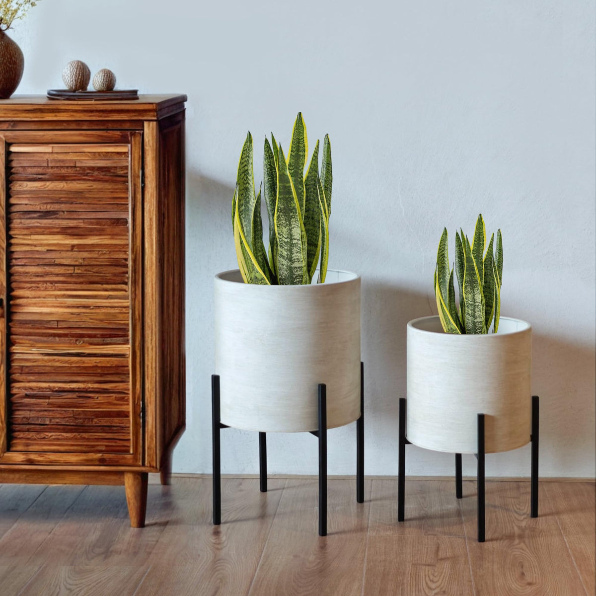 ARNIS durable metal planter with bottom drain holes.