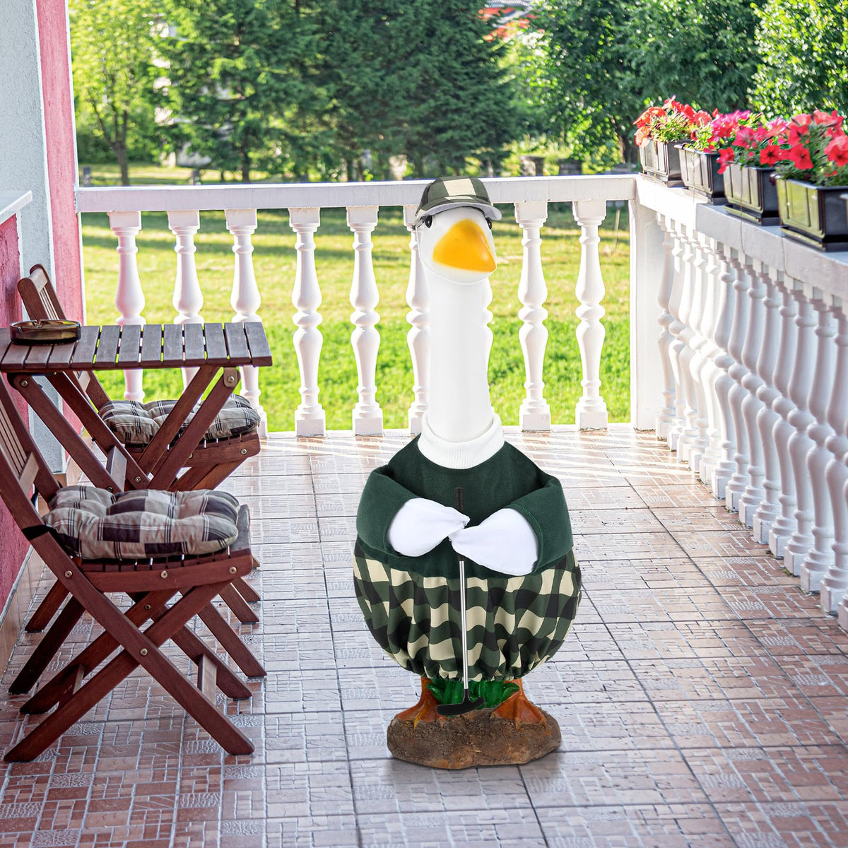 Arrowbash porch goose costume in green and black stands out.