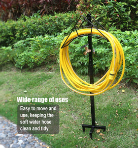 Artigarden hose organizer in garden setting, keeping tools and hose accessible.