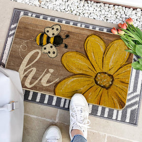 Artoid Mode Bee Daisy Hi Spring Doormat at entryway highlighting durable build