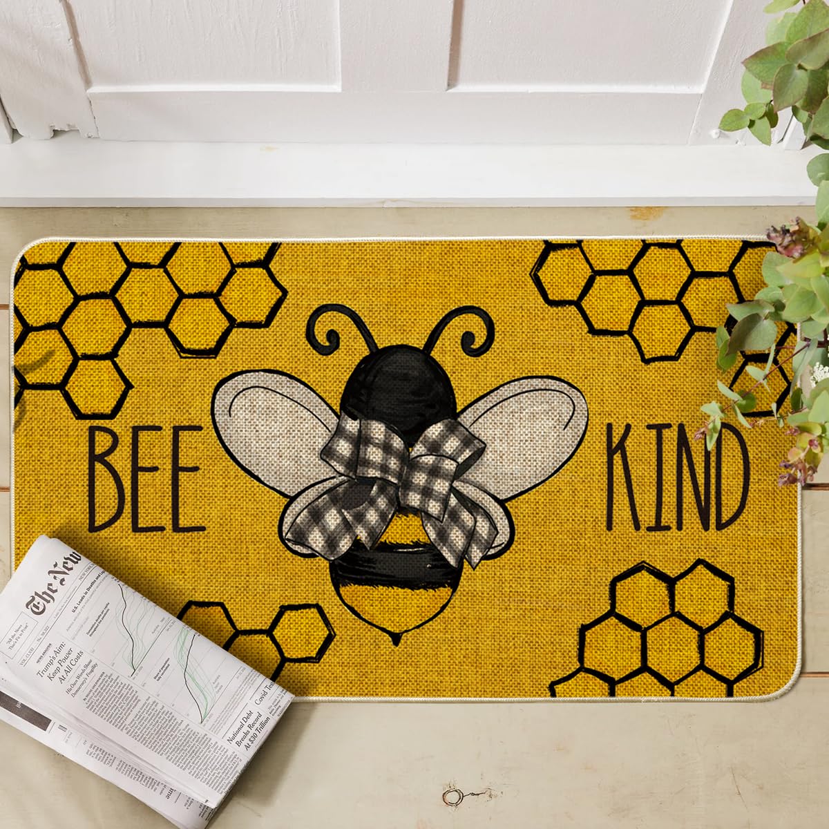 Artoid Mode Bee Kind Bow Tie Yellow Spring Doormat demonstrates low-profile entryway integration.