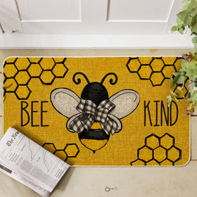 Artoid Mode Bee Kind Bow Tie Yellow Spring Doormat demonstrates low-profile entryway integration.