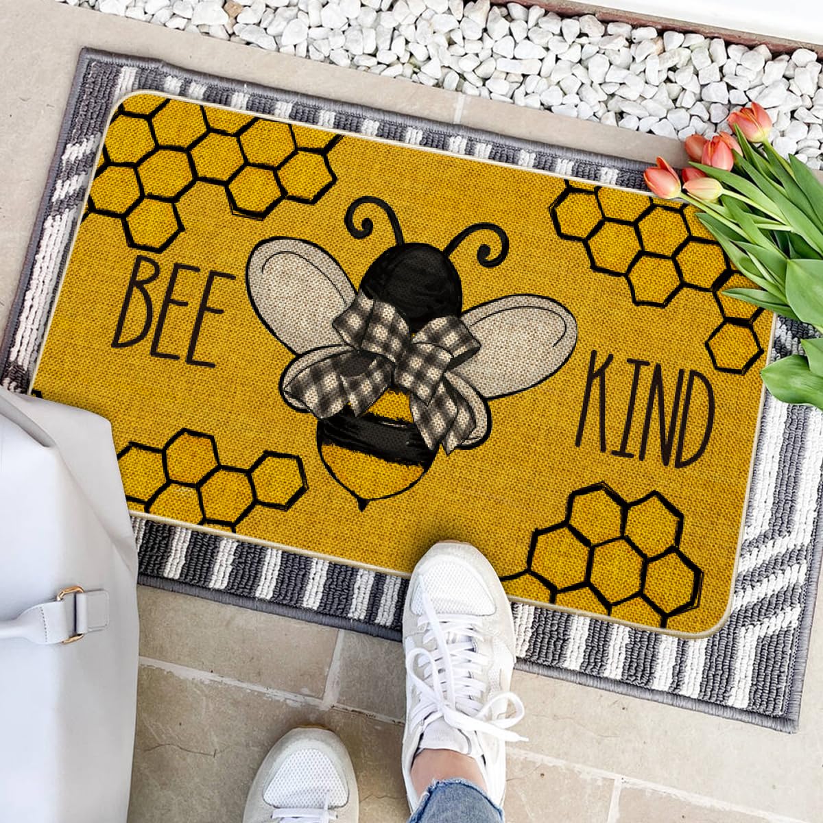 Bee Kind Bow Tie Yellow Spring Doormat shows non-slip rubber backing for stability.