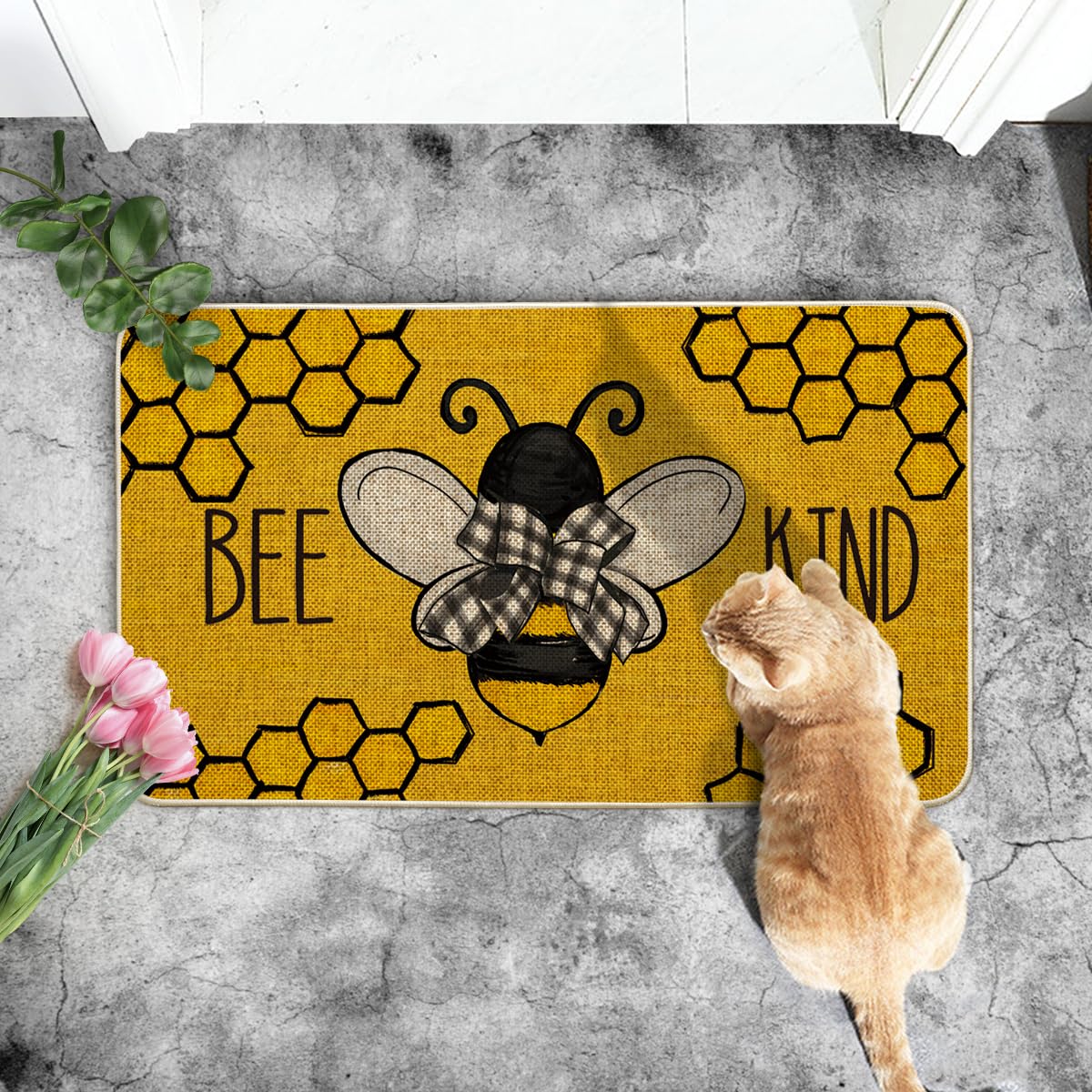 Artoid Mode Bee Kind Bow Tie Doormat is easy to clean with a hose or mild detergent.