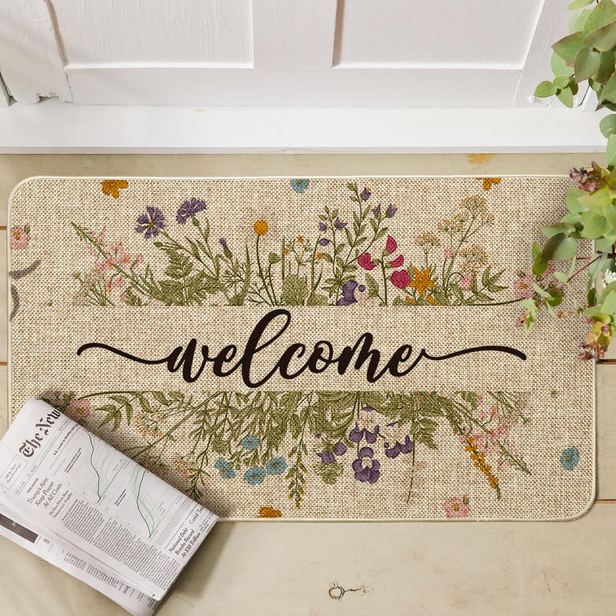 Artoid Mode low-profile 17x29 entryway mat fits doors without snag.