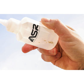 ASR Outdoor magnifying tweezers help inspect found minerals.