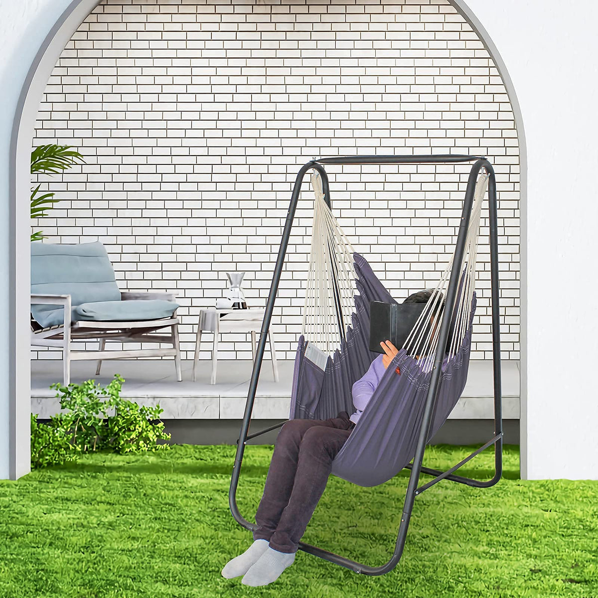 Asrnten YUCAN stand weighs 19 pounds and occupies 9 sq ft, tool-free setup.