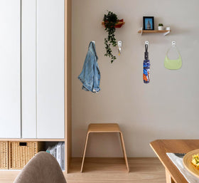 ASZUNE white 2.5in ceiling hook hanging a lantern.