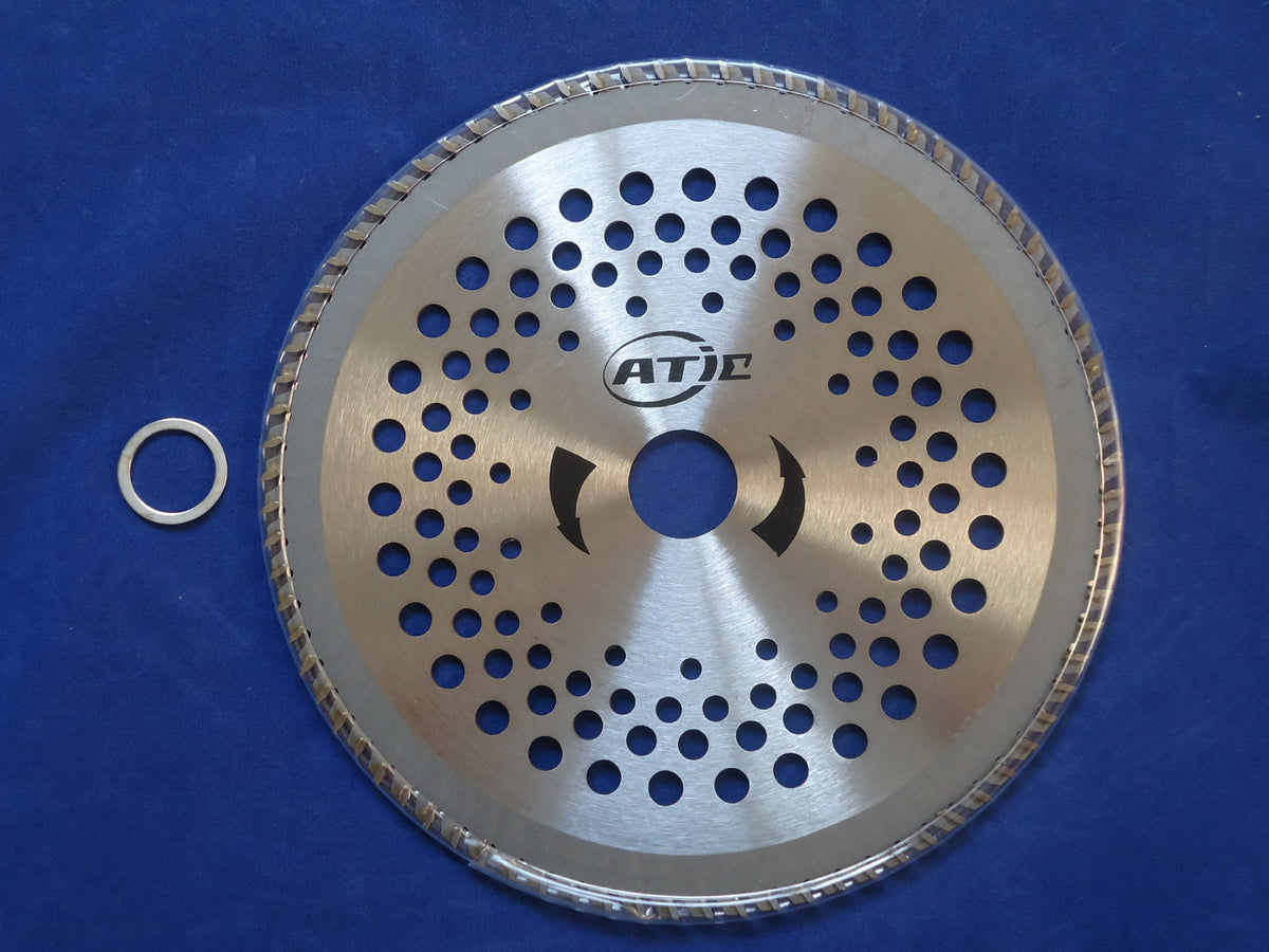 ATIE carbide-tipped trimmer blade close-up showing welded tips for durability.