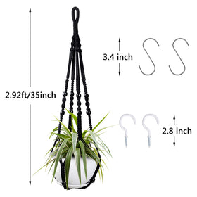 Augshy macrame planter with wood beads detail adds decorative flair.