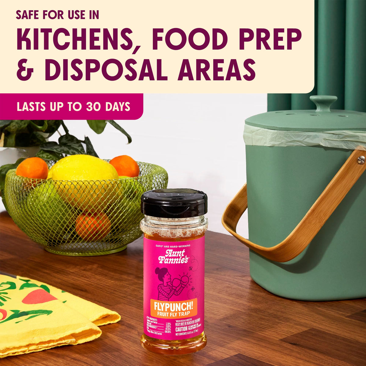 FlyPunch trap positioned near a compost bin to show placement options