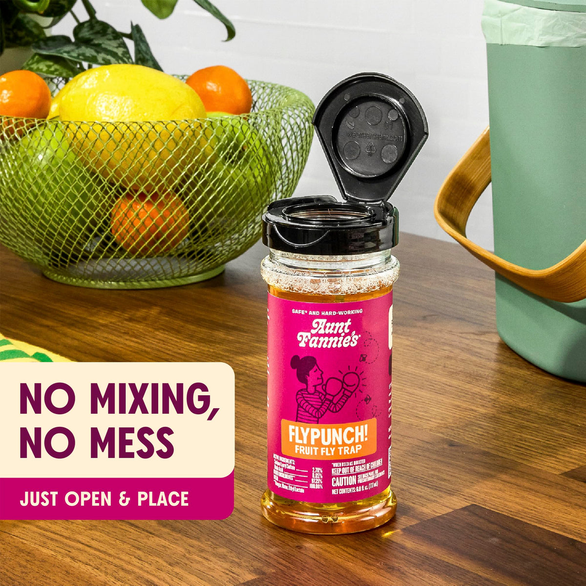 Aunt Fannie's FlyPunch placed near food safely for pest control.
