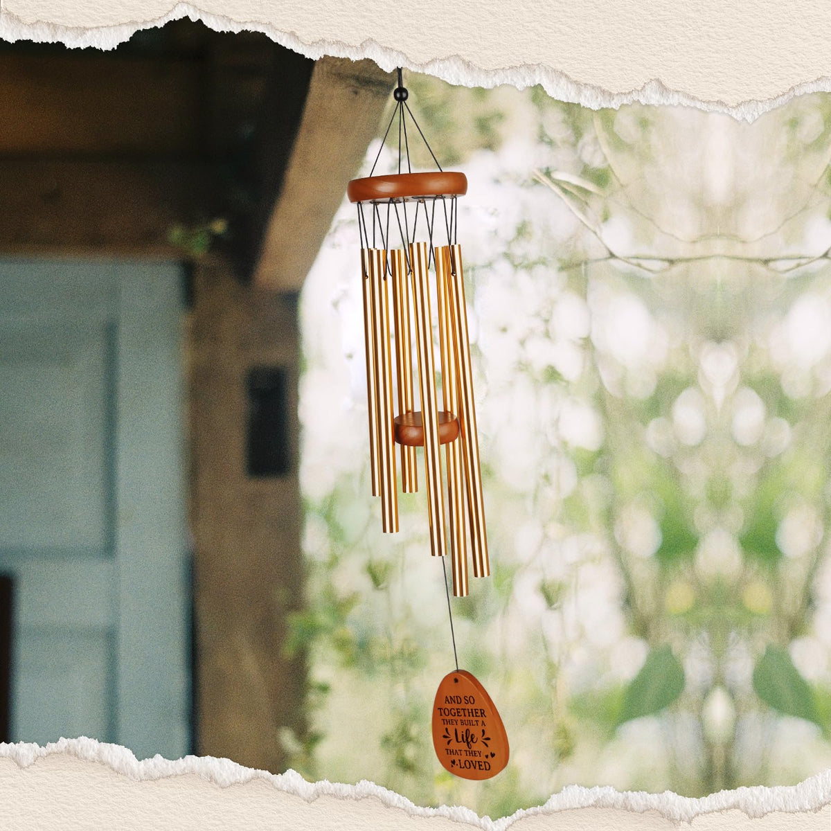 Aurahouse wedding wind chime hanging by a window enhances decor.