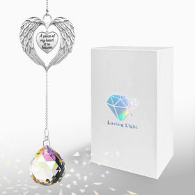 Aurlova memorial suncatcher crystal ball reflects rainbow light, inviting peaceful remembrance.