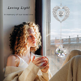 Aurlova memorial suncatcher displays a sympathy message that glows in sun.