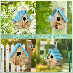 Auslar Bird House in a garden setting for peaceful backyard birdwatching.