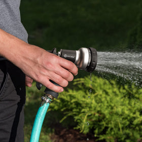 AUTOMAN nozzle ideal for garden beds, lawn, car washing, and pet showers.
