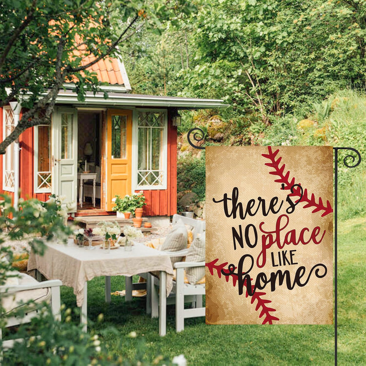 AVOIN Colorlife flag displays 'There's No Place Like Home' on both sides.