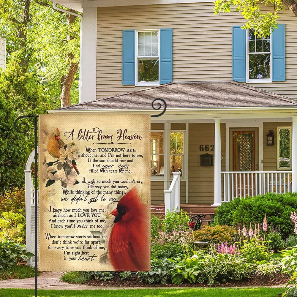 AVOIN colorlife Cardinal Memorial Flag used as outdoor decor in garden