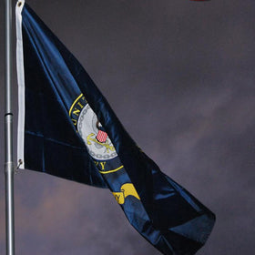 AXJBW navy embroidered flag back view showing double-sided design