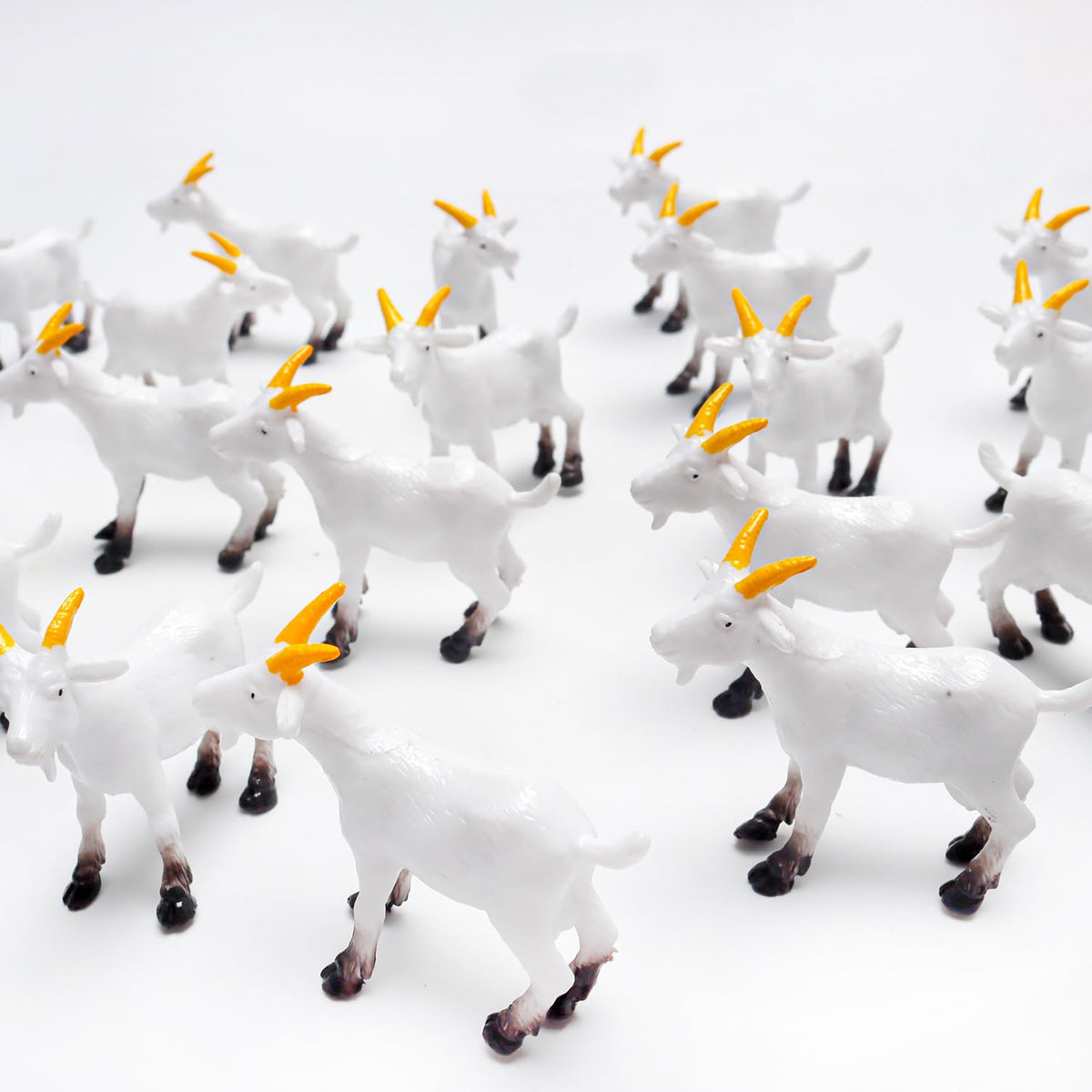 Aydinids tiny goat figurine in a lush miniature garden scene for DIY decor
