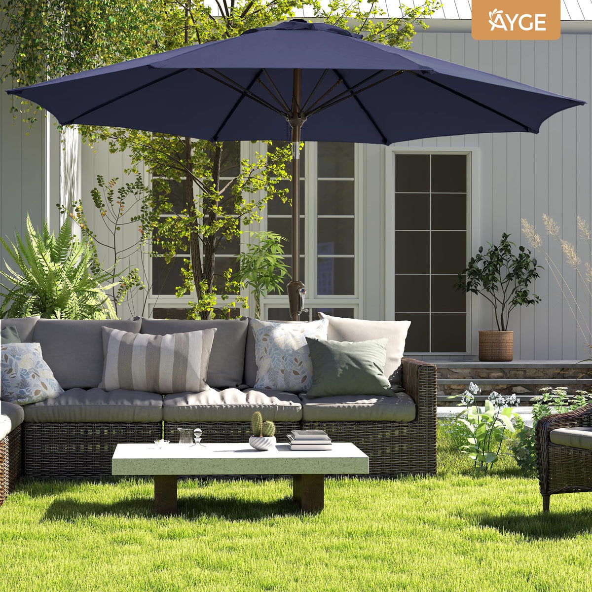 Ayge umbrella set up over a deck with a table provides instant shade.