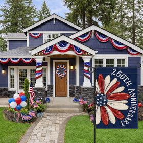 Aymolas flag hanging in garden for outdoor patriotic decor.
