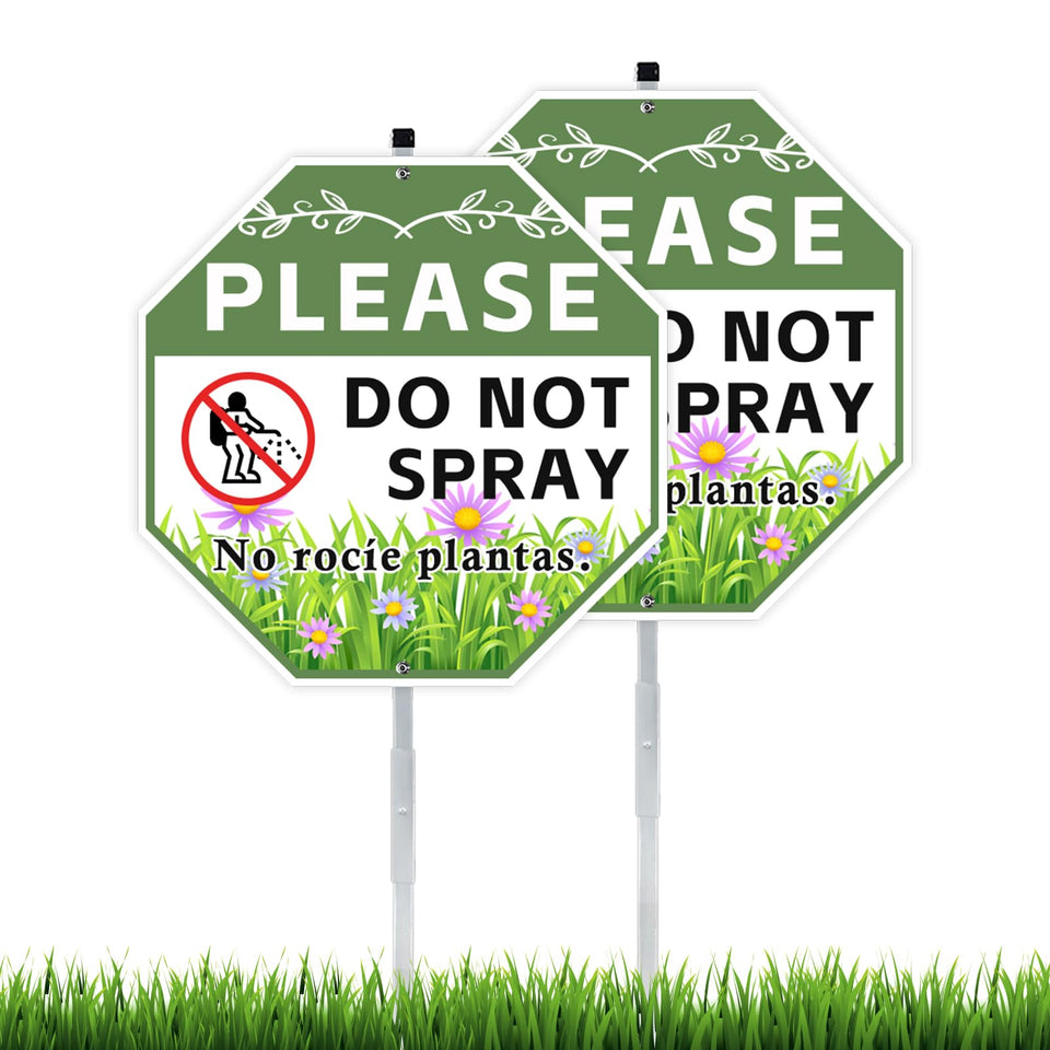 AzReference do-not-spray sign two-pack with stake installed in a sunny yard for outdoors