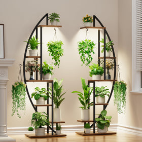 BACEKOLL plant stand with grow lights illuminating indoor plants across six tiers