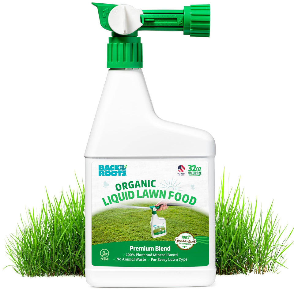 Back to the Roots liquid lawn food bottle being poured for even lawn coverage.