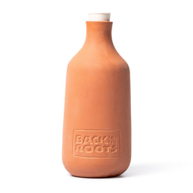 Back to the Roots Olla pot weatherproof stopper reduces evaporation.