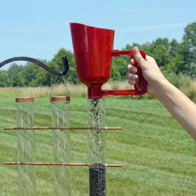 Backyard Essentials bird seed scoop makes bag-to-feeder transfers clean.
