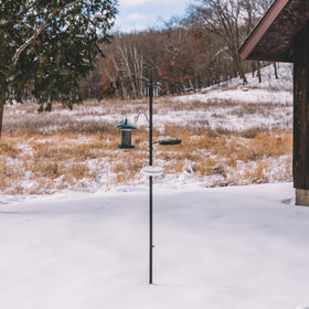 Backyard Expressions 75-inch pole stands sturdy against weather and wind.