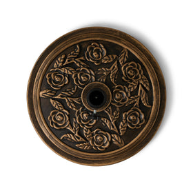 Backyard Expressions umbrella base in antique bronze finish adds decorative flair while anchoring a deck umbrella.