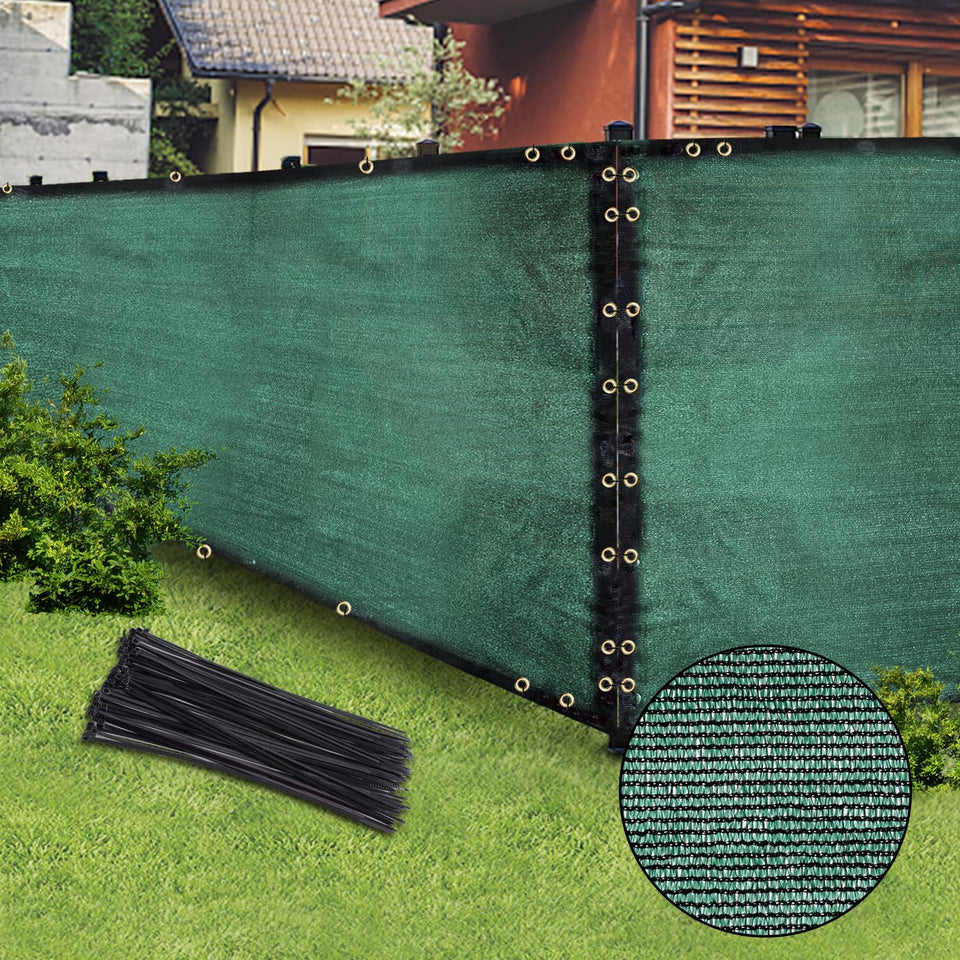 BADAO Green Privacy Screen mounted on a fence, enhancing backyard privacy.