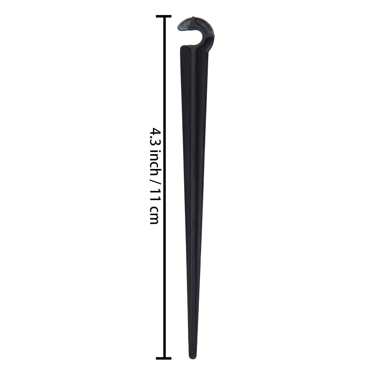 Balter-D irrigation stake ground insertion shown for secure tubing placement.