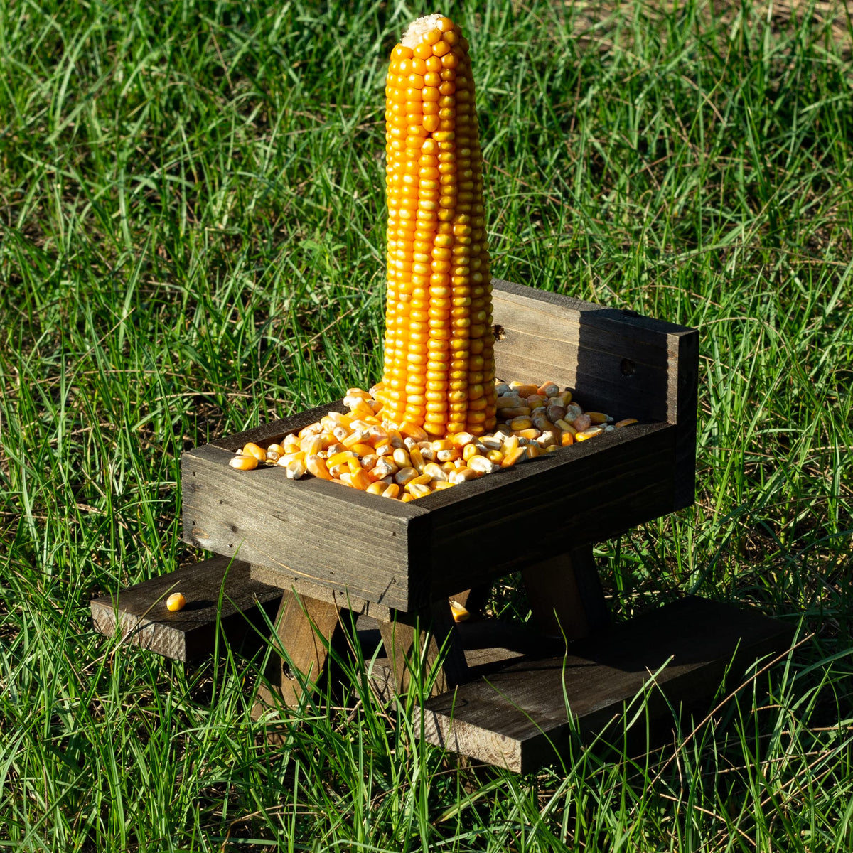 BalterFF Squirrel Feeder in natural wood design enhances garden ambiance and wildlife viewing.