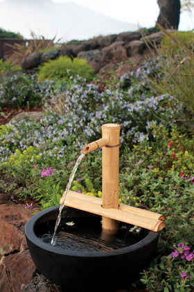 Bamboo Accents handcrafted bamboo spout adds natural texture to spaces.