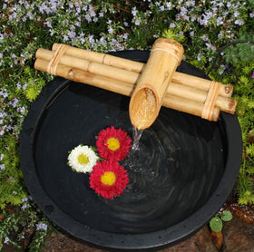Bamboo Accents indoor tabletop fountain fits meditation spaces with subtle sound.