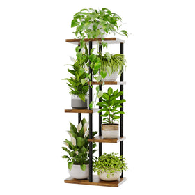 Bamworld corner plant stand 5-tier displays lush plants in a compact living room corner.
