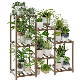 Bamworld plant stand with seven pots on a ladder for sunlit indoor display.
