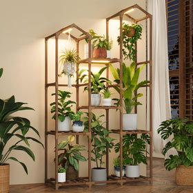 Bamworld plant stand with grow light displaying lush greens in a modern corner